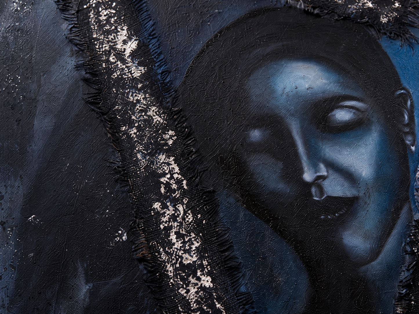 Calm in the Storm by Ludwina Orchard – close-up detail of a serene female face in blue-grey tones with hessian texture and silver leaf running diagonally across