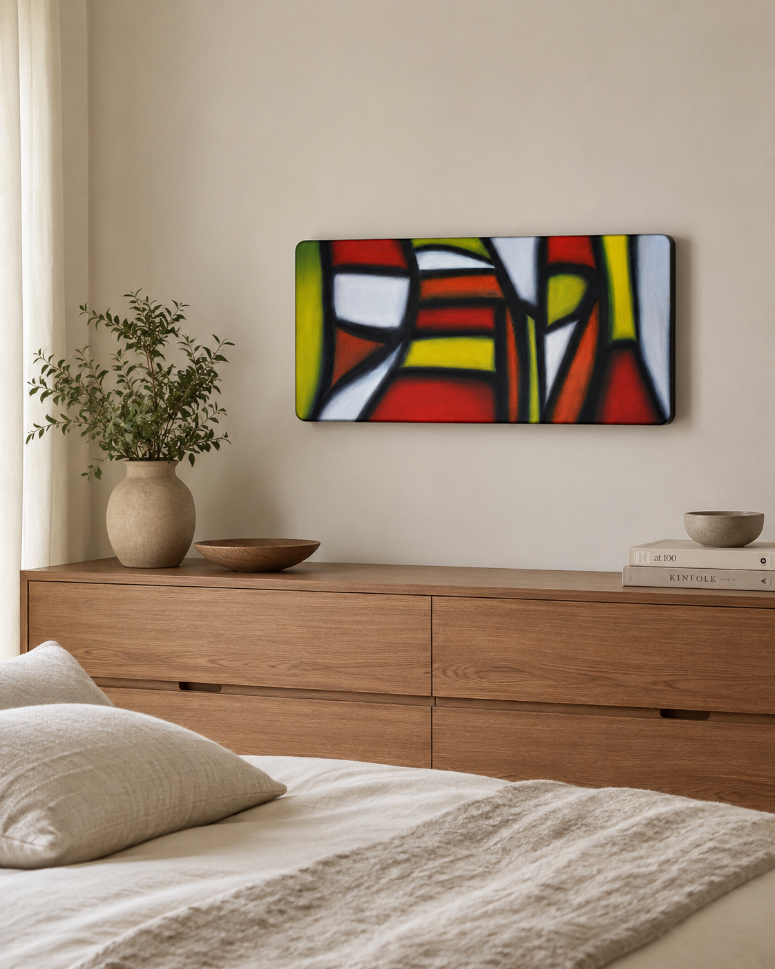 Crossroads by Ludwina Orchard – abstract geometric painting with red, yellow, black and white shapes displayed above a wooden dresser in a warm neutral bedroom