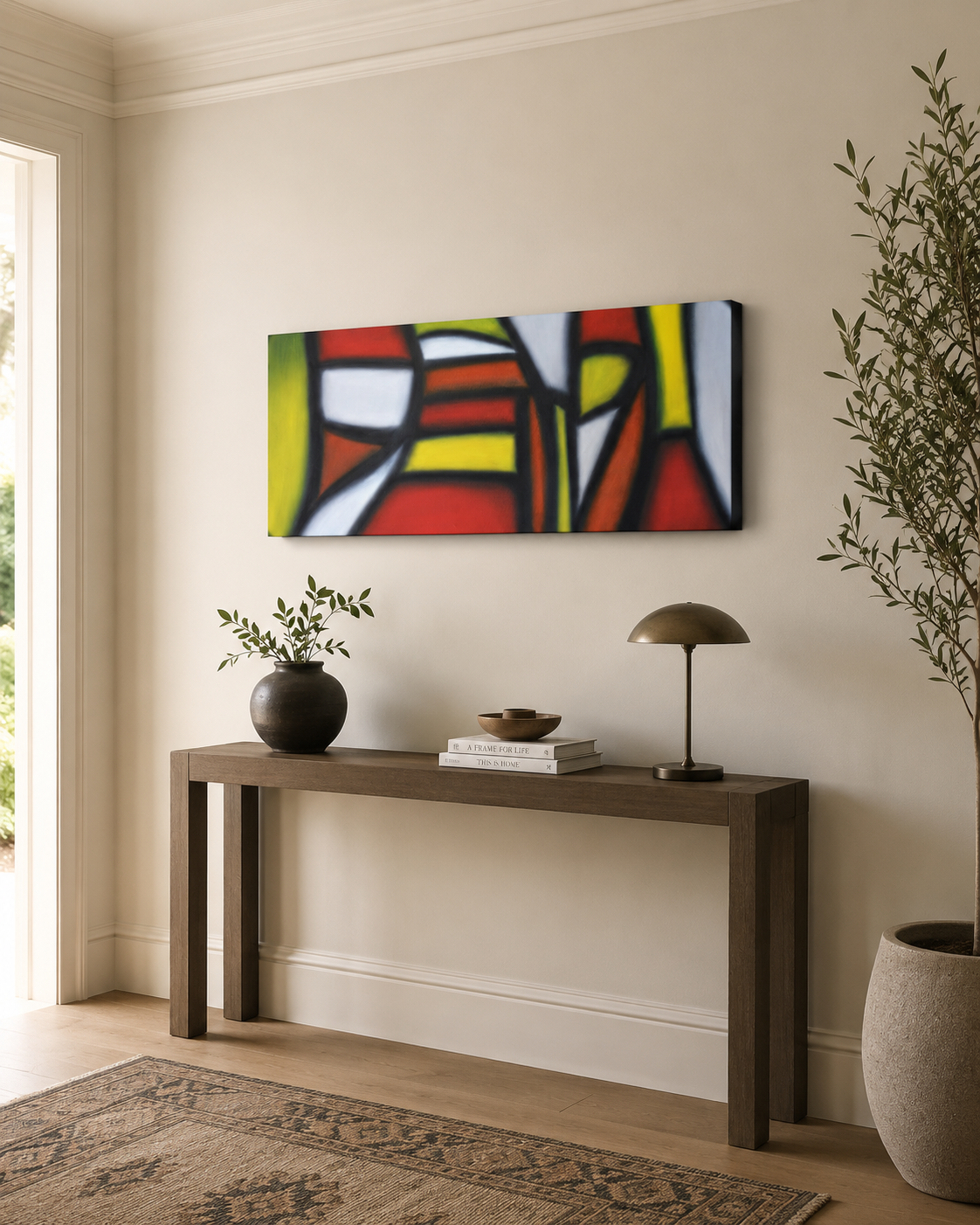 Crossroads by Ludwina Orchard – abstract geometric painting with red, yellow, black and white shapes displayed above a dark wood console table in a styled entryway