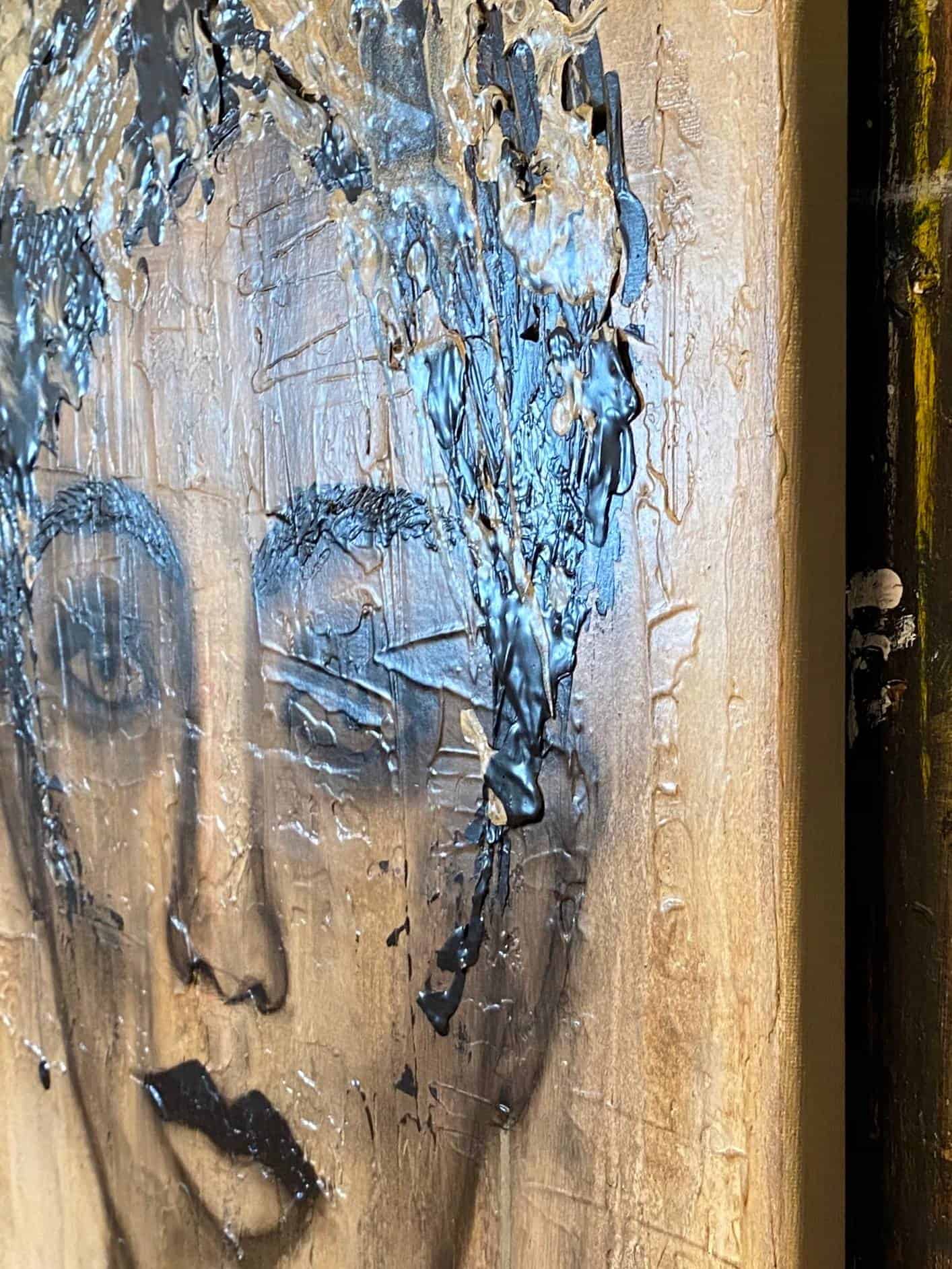 Earth Goddess by Ludwina Orchard – close-up detail of the textured acrylic portrait showing the face rendered in raised paint and gold tones