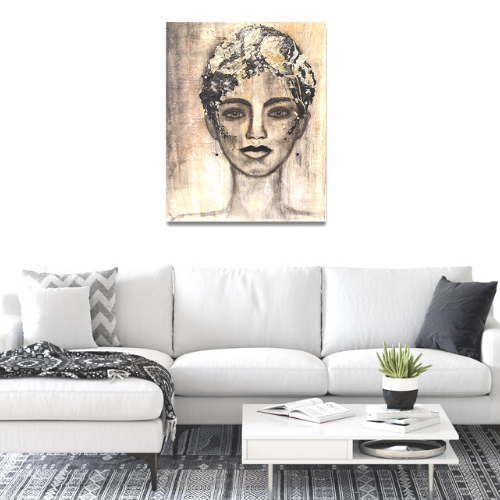 Earth Goddess by Ludwina Orchard – acrylic portrait painting displayed above a white sofa in a modern living room with a grey patterned rug