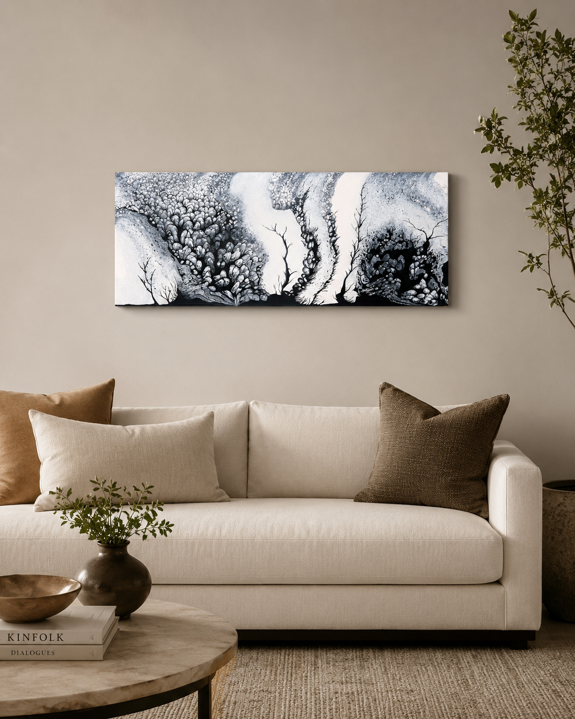 Endless Garden by Ludwina Orchard – monochromatic acrylic painting displayed above a cream sofa in a cozy styled living room