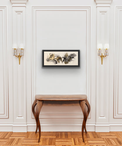 Golden Dreams by Ludwina Orchard – alcohol ink painting displayed above an ornate wooden console table in an elegant white room with decorative moulding and wall sconces
