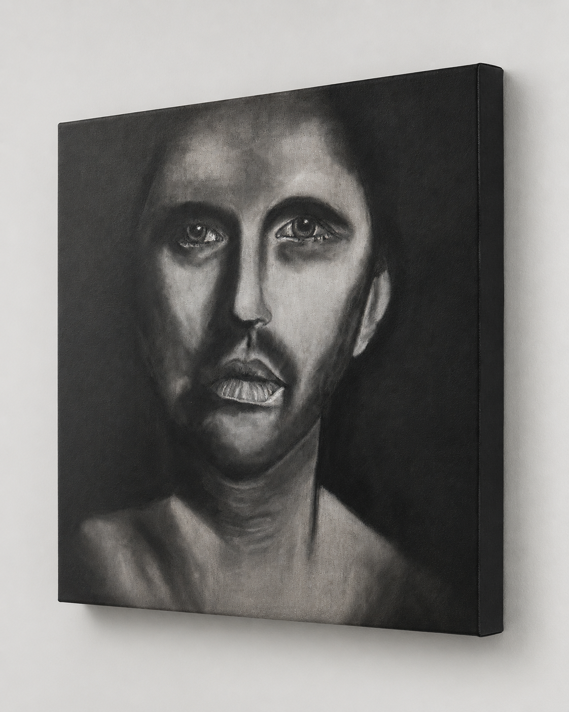 The Man Within by Ludwina Orchard – side view of the charcoal portrait on canvas showing the depth and texture of the artwork