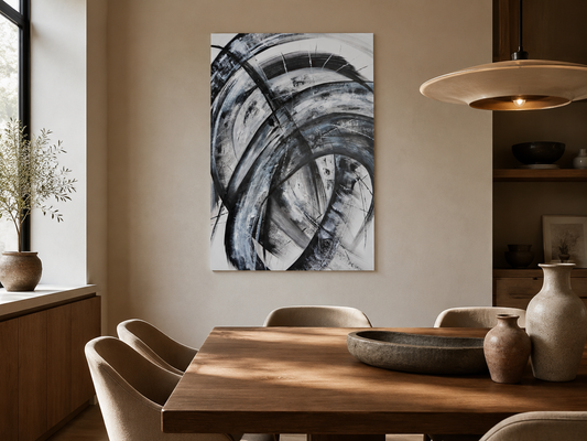 The Unspoken Change by Ludwina Orchard – black and white ink painting displayed on a wall in a warm styled dining room with a wooden table