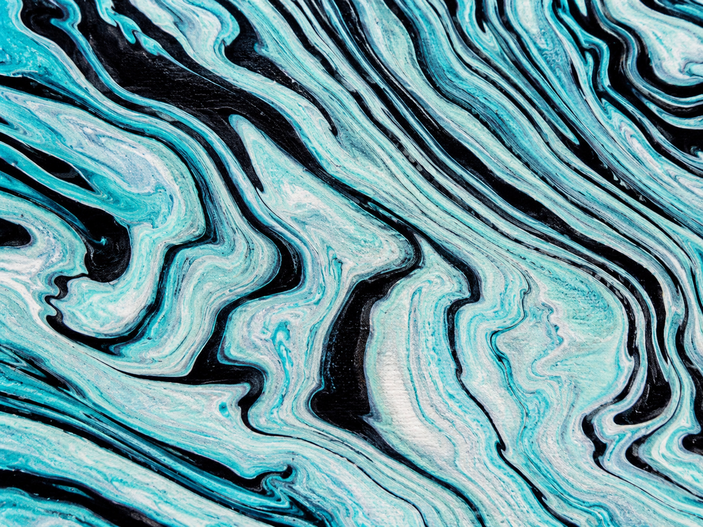 Tigerlily by Ludwina Orchard – close-up detail of the acrylic pour showing fluid teal, black and white marbled patterns