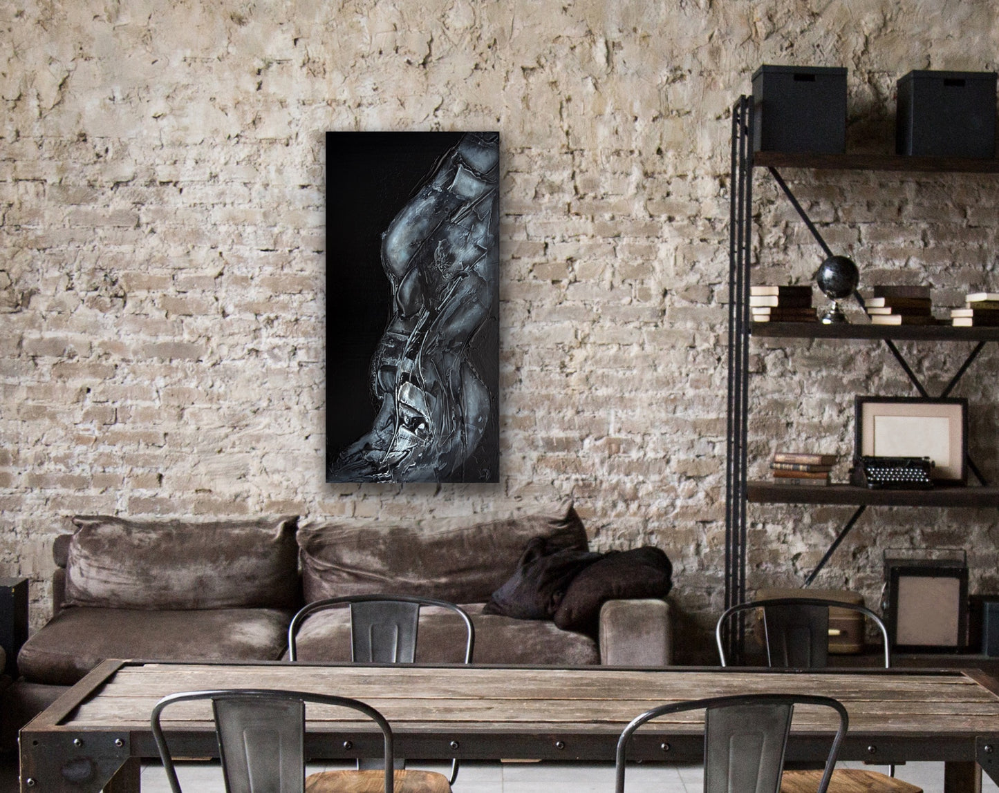 Xray of a Woman by Ludwina Orchard – artwork displayed in an industrial loft dining room with exposed brick wall, leather sofa and metal shelving